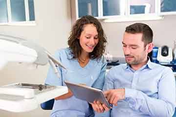 Patient talking to a dentist