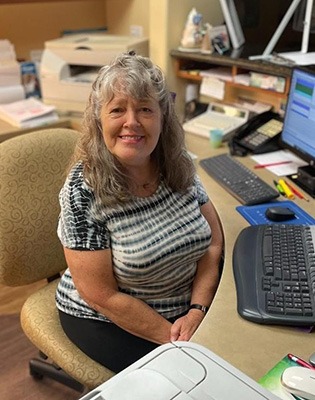 Christie, Office Manager