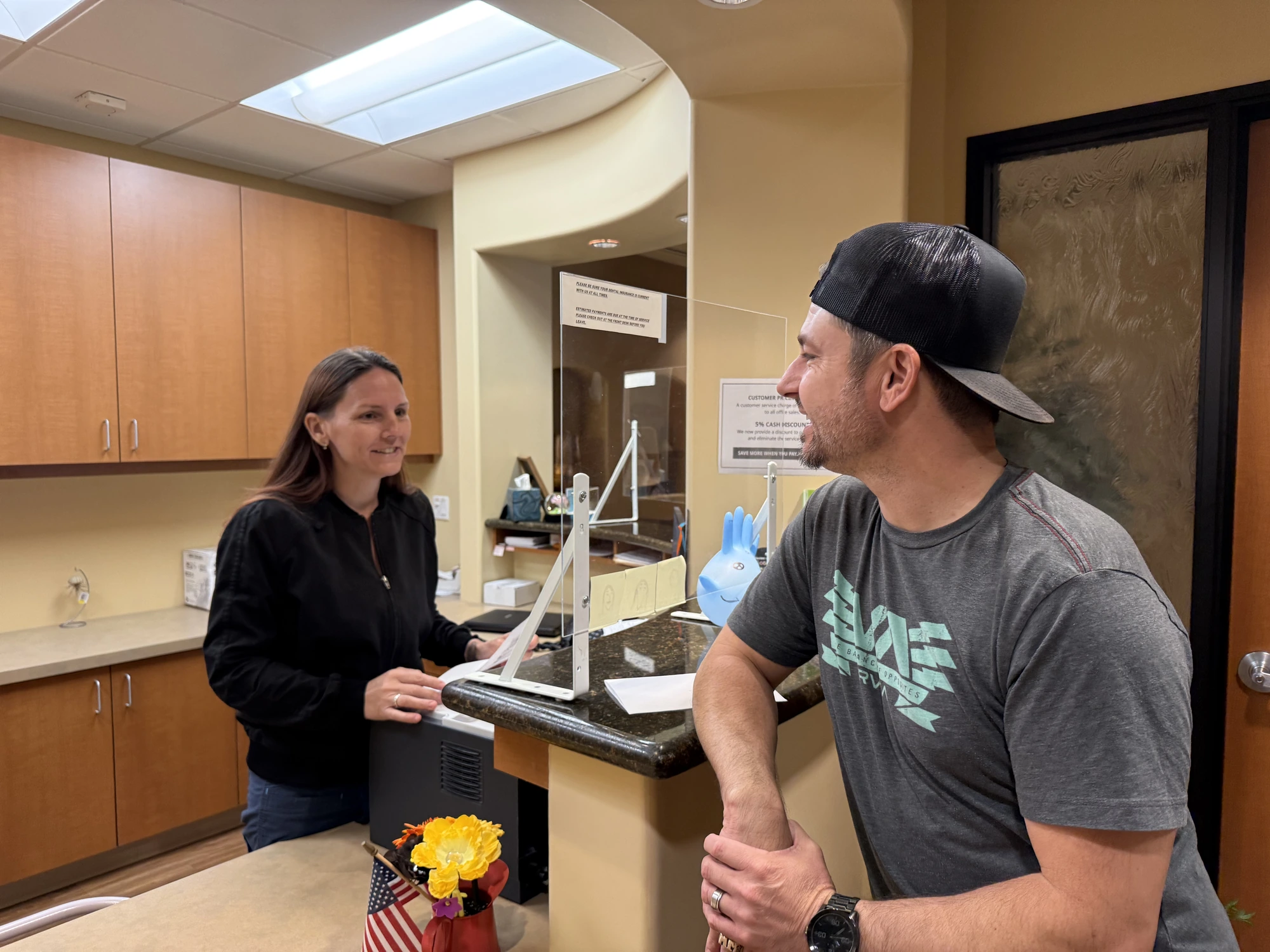 A patient in a relaxed consultation at Zhang Dental Group of Tustin